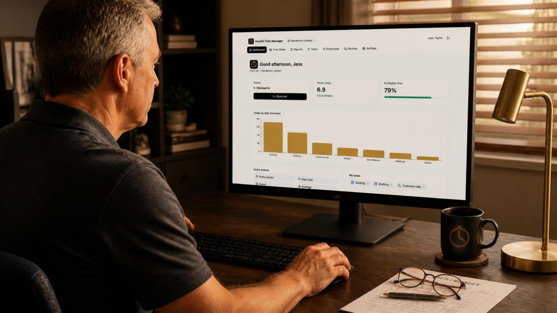 Business owner reviewing the Time Manager dashboard